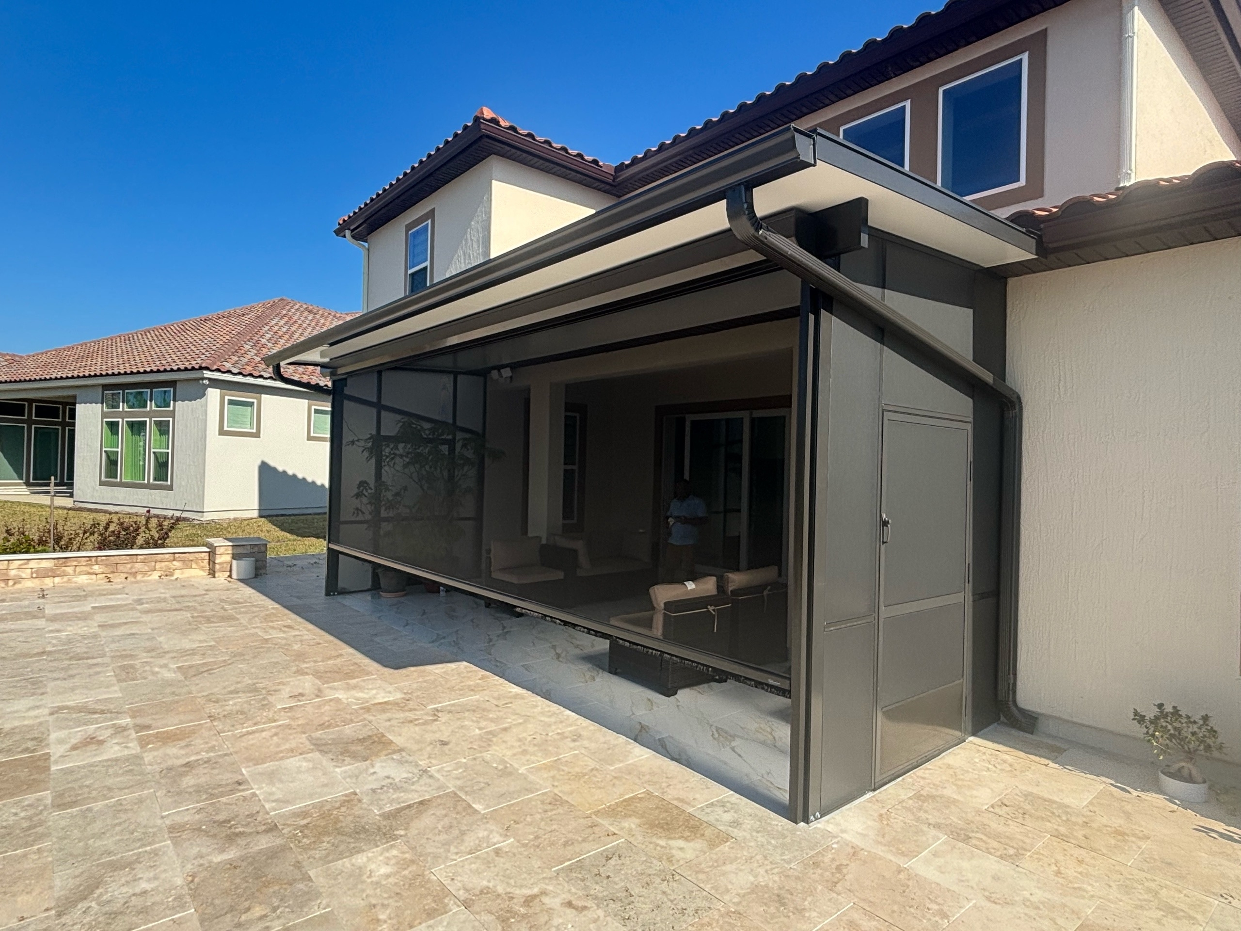 Composite roof with rolldown screen system